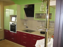 Corner kitchens with pencil case and refrigerator photo