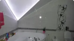 Suspended ceilings with lighting in the bathroom photo