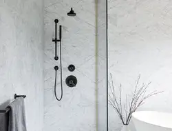 Bathroom With Black Faucets Photo