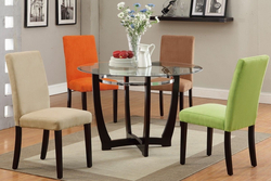 Chairs of different colors in the kitchen interior