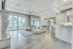 Floor design in the living room combined with the kitchen