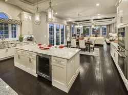Island in the interior of the kitchen living room photo