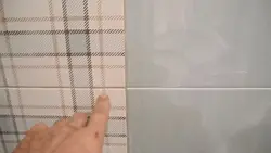 Рангҳои grout барои сафолҳои ванна акс