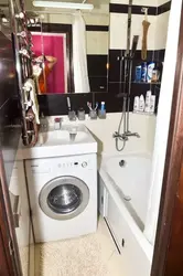 Placing a washing machine in the bathtub photo