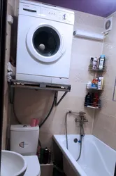 Placing a washing machine in the bathtub photo