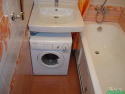 Installing a washing machine in the bathroom photo