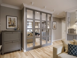 Living room interior with door to bedroom