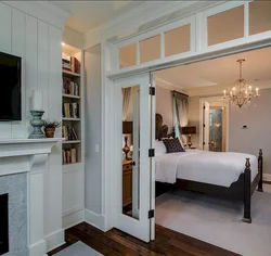 Living room interior with door to bedroom