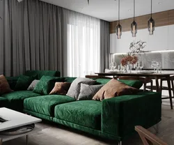 Green sofa in the living room interior and photo curtains in the interior