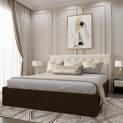 Bedroom design with a bed with a soft headboard