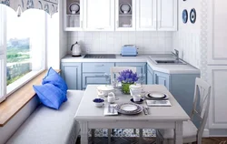 Photo of small blue kitchen