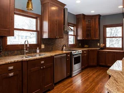 What color goes with brown in the kitchen interior photo