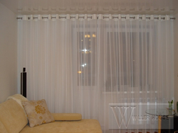 Tulle барои як ҳуҷраи зиндагӣ дар як квартира акс