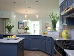 Color combination in the interior of a gray-blue kitchen