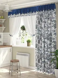 White curtains in the kitchen in the interior photo