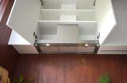 Kitchen with large hood photo