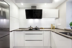 Kitchen with large hood photo
