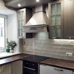 Kitchen with large hood photo