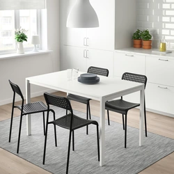 Light chairs in the kitchen interior