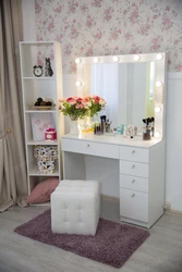Ladies table with mirror in the bedroom with lighting photo