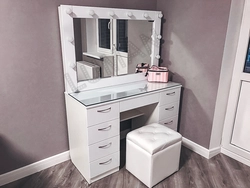 Ladies table with mirror in the bedroom with lighting photo