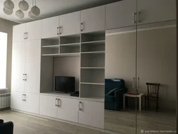 White wardrobe in the living room interior photo