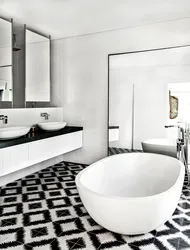 Dark tiles on the bathroom floor photo