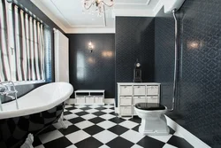 Dark tiles on the bathroom floor photo