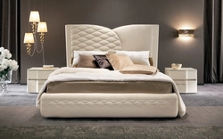 Bedroom design with soft headboard photo