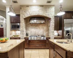 White kitchen with artificial stone photo