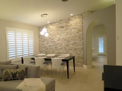 White kitchen with artificial stone photo