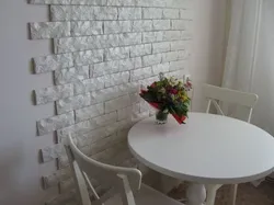 White kitchen with artificial stone photo