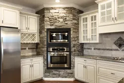 White kitchen with artificial stone photo