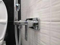 Hygienic shower in the bathroom in the interior