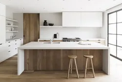 White kitchen and wooden table photo