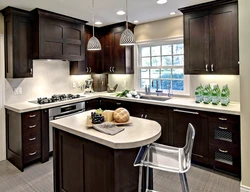 Kitchen design in a modern corner style with a window in the house