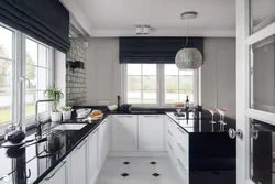Kitchen design in a modern corner style with a window in the house