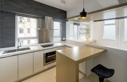 Kitchen Design In A Modern Corner Style With A Window In The House