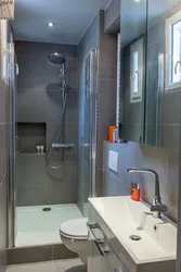 Design of a small bath with shower tile photo