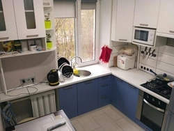 Kitchen design small sink by the window
