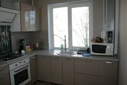 Kitchen design small sink by the window