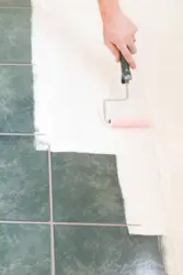 Painting bathroom tiles photo