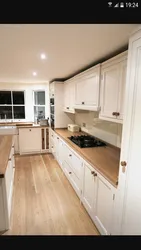 Kitchens in a modern style with a wooden countertop photo