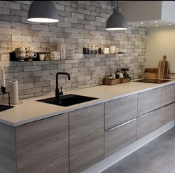 Photo of a kitchen without upper cabinets in style