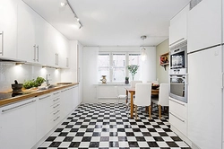 Kitchen design with black and white floor