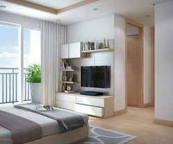 Bedroom interior with bed and tv