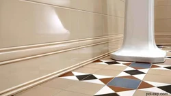 Plinth for bathtub made of tiles photo