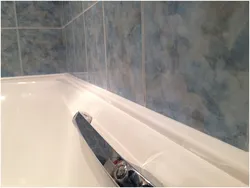 Plinth for bathtub made of tiles photo