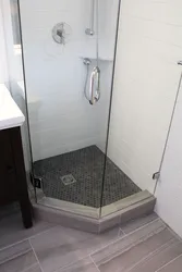 Photo of a bathroom with a tiled shower