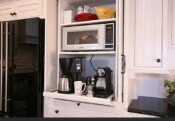 Built-in appliances in a small kitchen photo